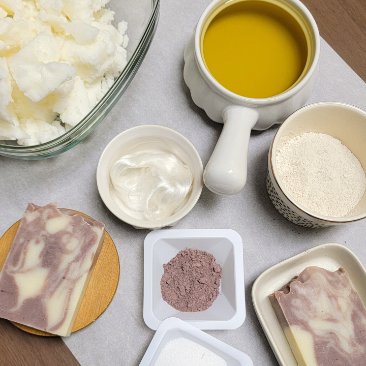 Unwind with Lavender Silk Natural Handmade Soap, a serene and nourishing bar crafted for a gentle, non-drying cleanse. Made with aloe vera juice, silk fibers, and purifying kaolin clay, this soap leaves skin soft, smooth, and refreshed. The soothing aroma of lavender, ylang ylang, and cedarwood promotes relaxation, making it the perfect addition to your nighttime or self-care ritual.