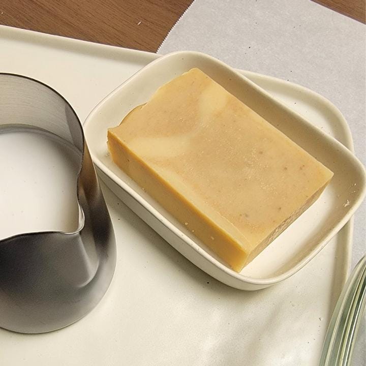 Our natural handmade soap is crafted with a thoughtful blend of nature-sourced ingredients, for a luxurious and nourishing cleansing experience. Rich botanical oils and butters provide deep hydration, while plant-based extracts soothe and protect the skin. We carefully select each ingredient—from creamy coconut milk and raw honey to mineral-rich clays and antioxidant-packed botanicals—to create a formulation that is both gentle and effective. No synthetic fragrances, no artificial colors.