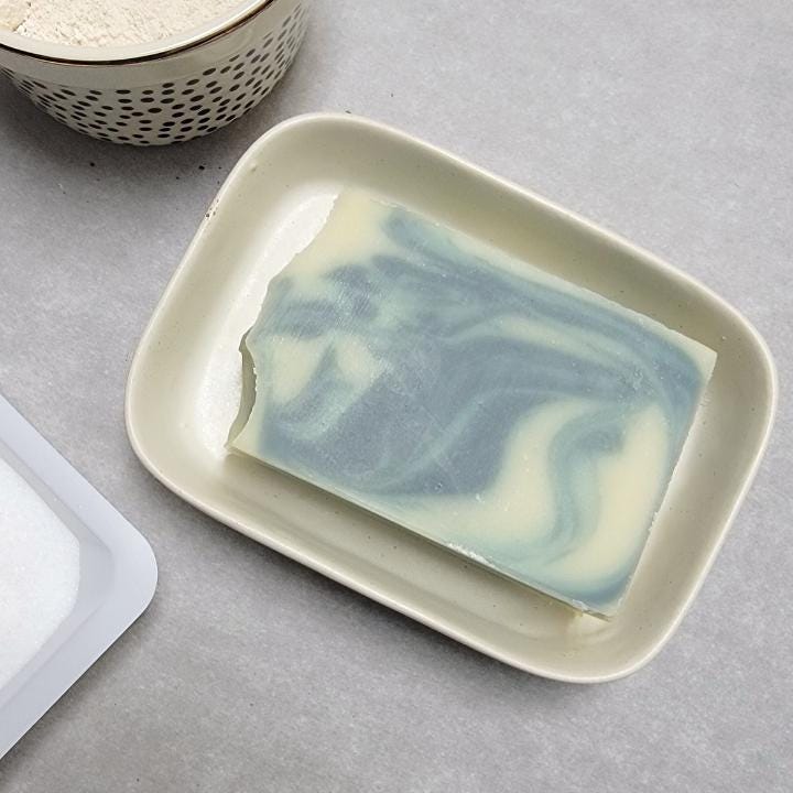 Our natural handmade soap is crafted with a thoughtful blend of nature-sourced ingredients, for a luxurious and nourishing cleansing experience. Rich botanical oils and butters provide deep hydration, while plant-based extracts soothe and protect the skin. We carefully select each ingredient—from creamy coconut milk and raw honey to mineral-rich clays and antioxidant-packed botanicals—to create a formulation that is both gentle and effective. No synthetic fragrances, no artificial colors.