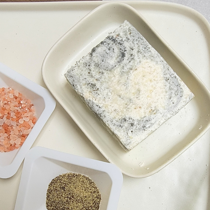 Sea Salt & Pepper Natural Handmade Soap is an invigorating, mineral-rich soap crafted with skin-loving ingredients and a bold, refreshing aroma. Our sea salt soaps are made in small batches using traditional soap-making methods. This luxurious spa bar provides a deep-cleansing, exfoliating experience while nourishing and revitalizing the skin.